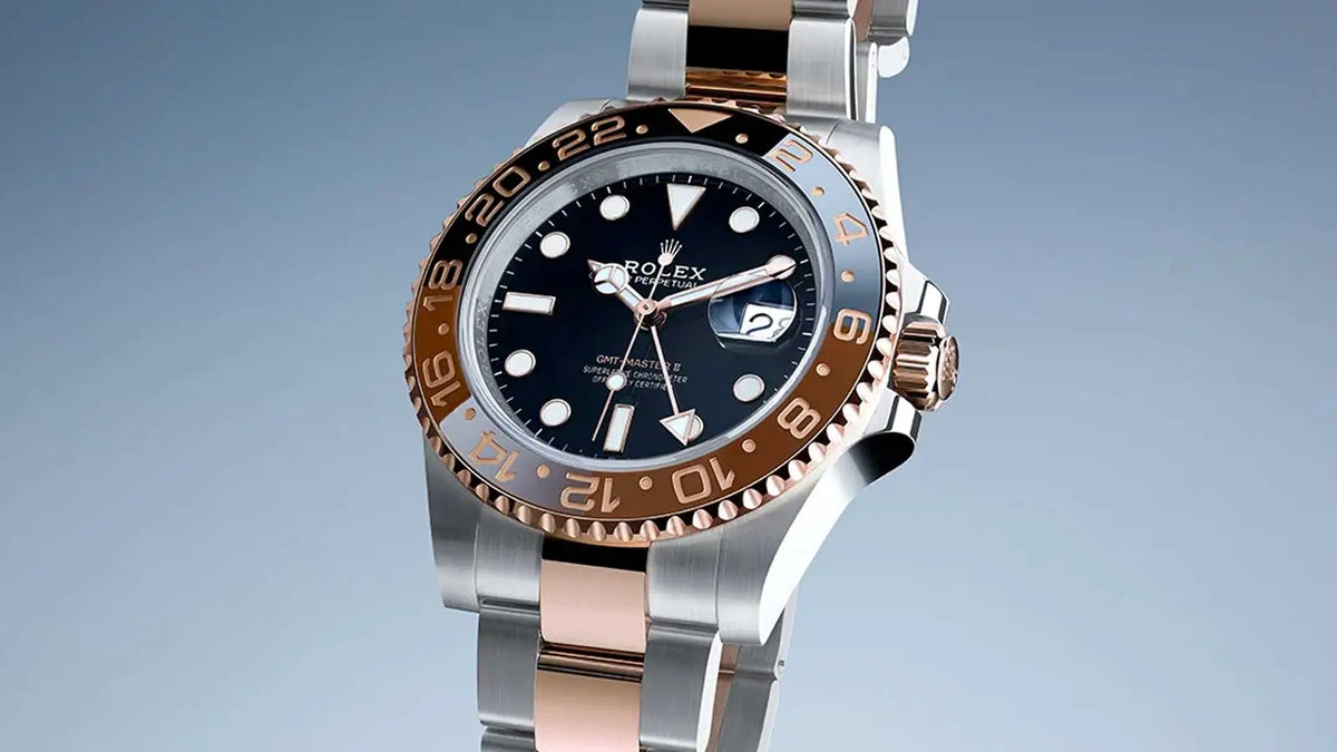 Orologio GMT acciaio e oro con quadrante nero