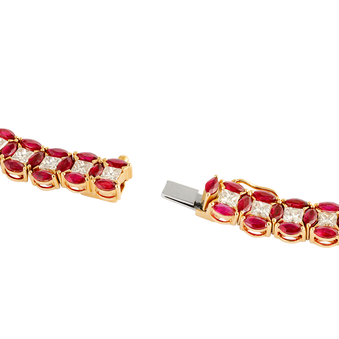 Gioiello in oro rosa Bracciale Diade in oro rosa con diamanti e rubini Pisa diamanti