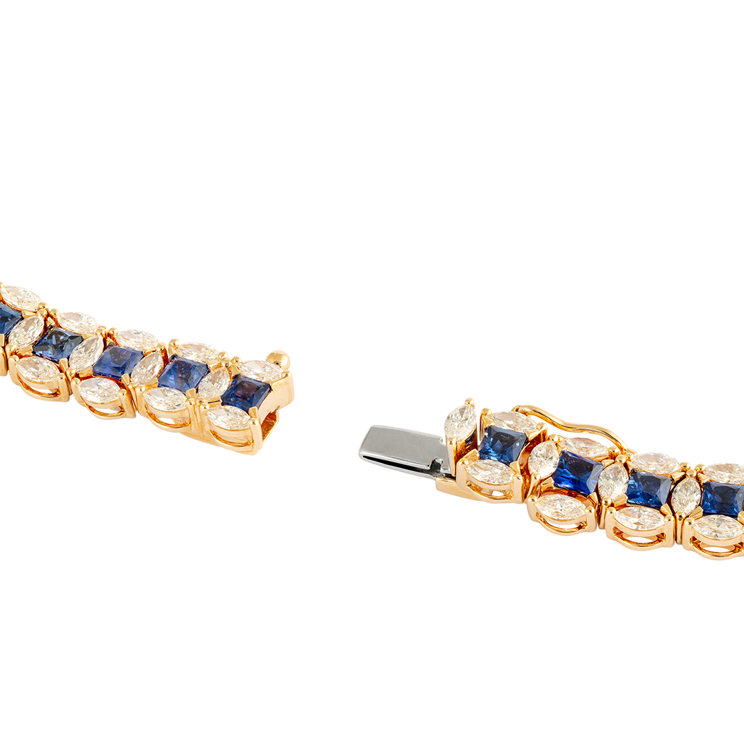 Gioiello in oro rosa Bracciale Diade in oro rosa con diamanti e zaffiri Pisa diamanti