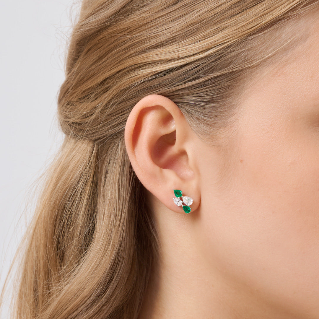 Earrings in white gold Diva white gold earrings with diamonds and emeralds Pisa diamanti