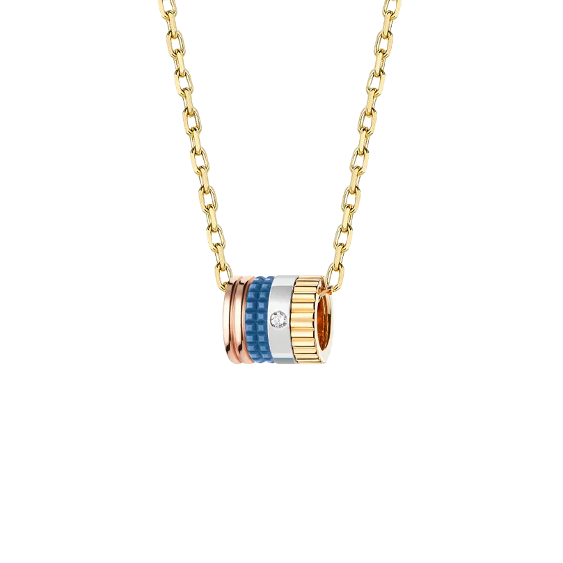 Gioiello in white, yellow, and rose gold Quatre Blue Edition Ring Pendant Boucheron